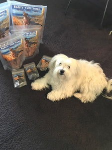 Oliver happy his treats have arrived